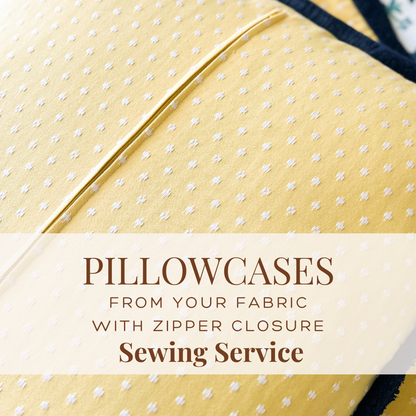 Yellow pillowcase with white polka dots and text about sewing service.
