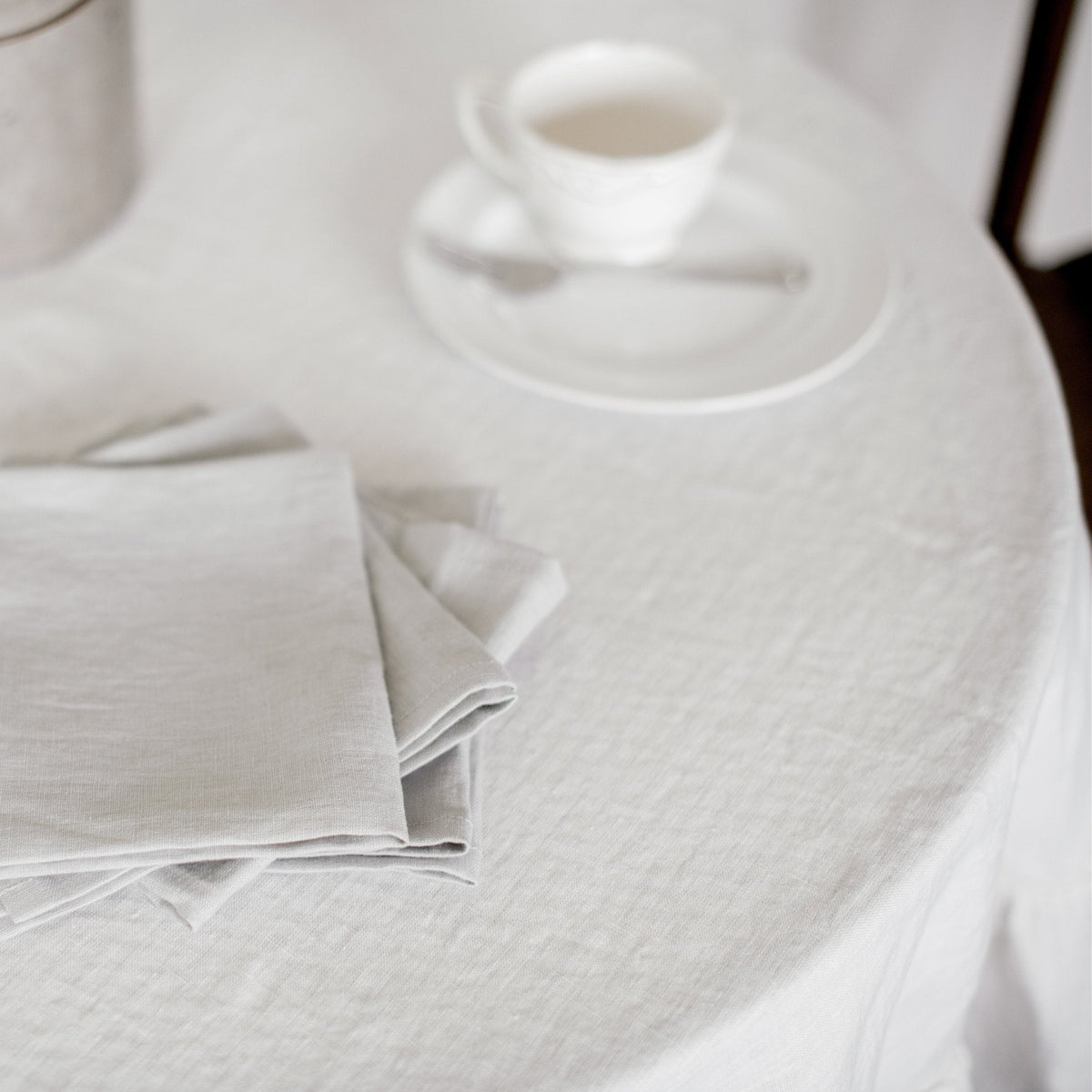 White napkins on a textured white surface