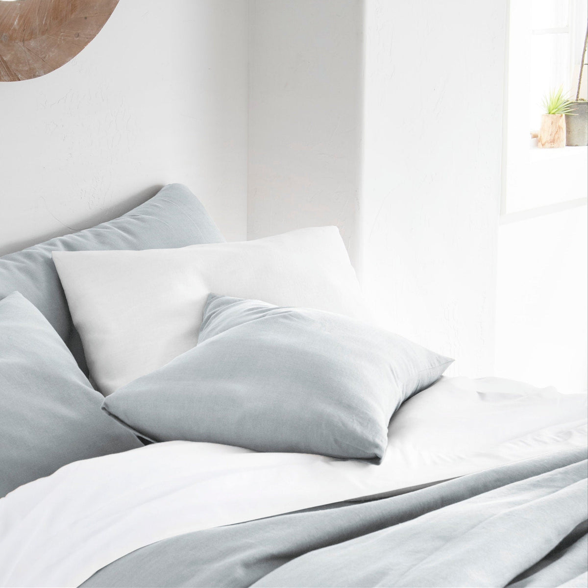 Set of 2 light bluish grey linen pillow covers / pillowcases with envelope closure.