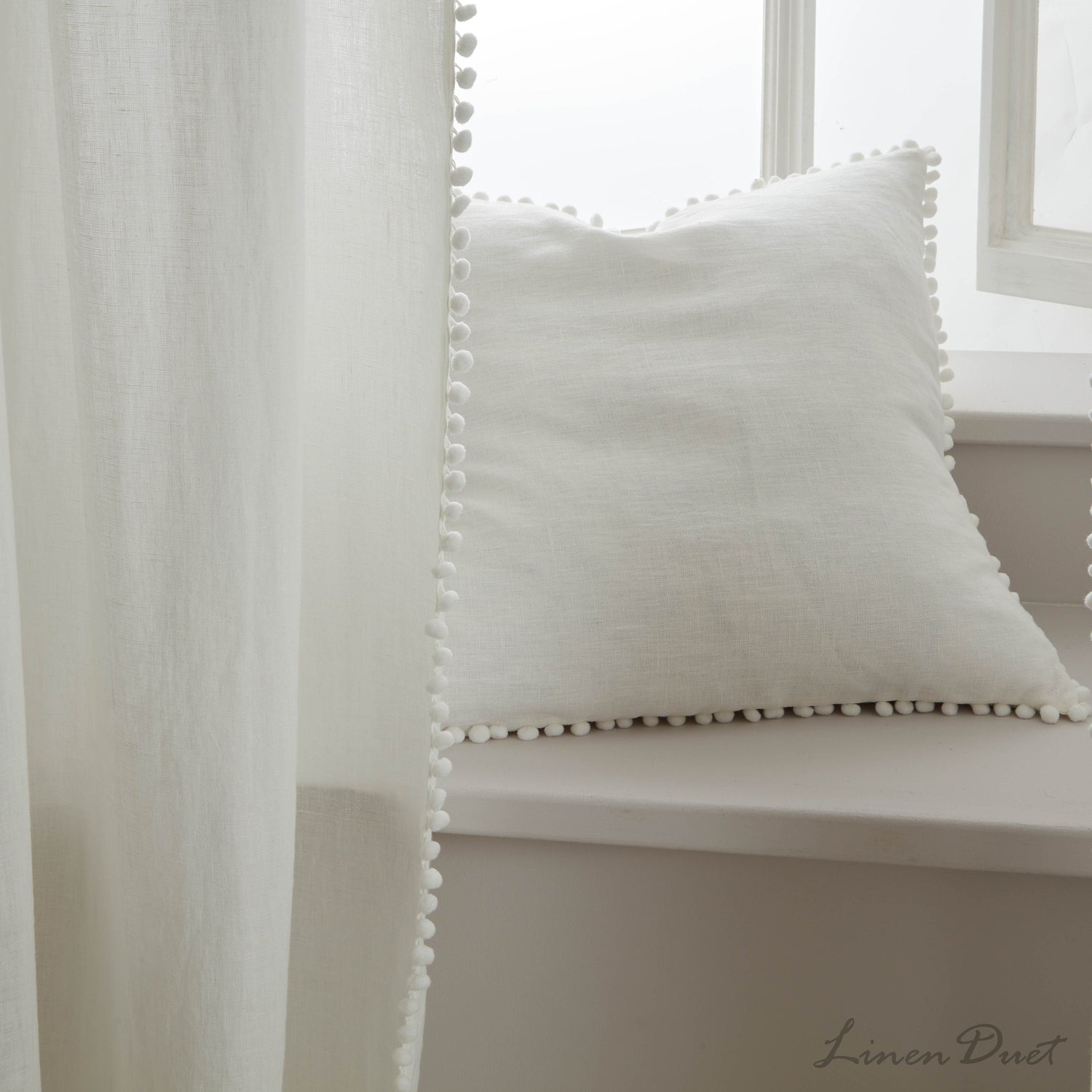 Natural linen curtain fabric with visible woven texture