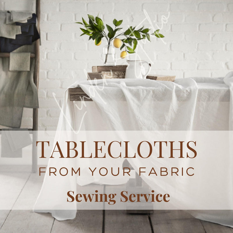 Tablecloth on a table with text overlay about fabric sewing service