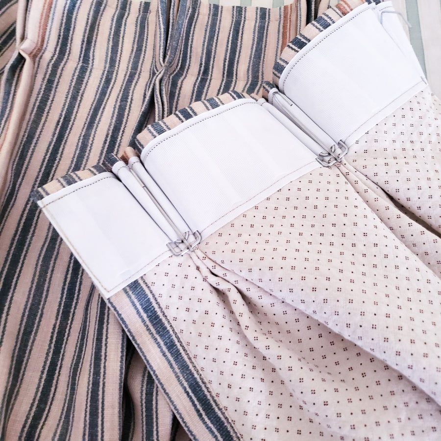 Custom pleated curtain headings sewn from customer-supplied patterned fabrics